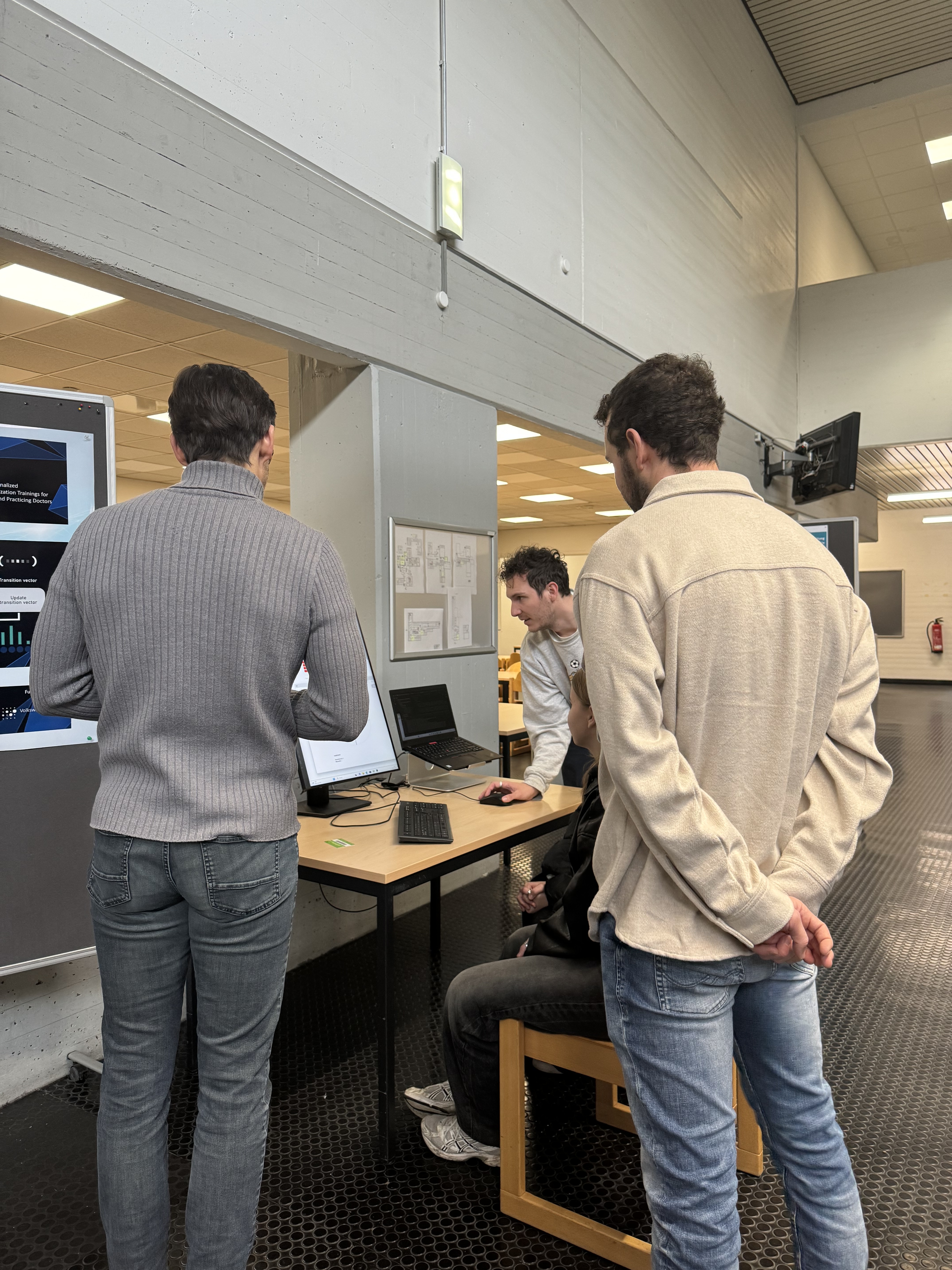 Visitors trying the PerTRAIN prototype at the Münster University Open Day 2025
